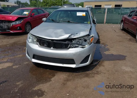 2014 Toyota Camry Le z USA, uszkodzony, nr VIN 4T4BF1FK7ER353620